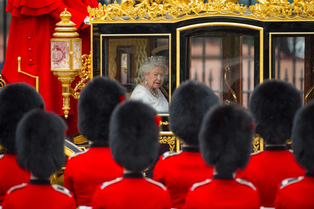 Queen Elizabeth II leaves Buckingham Palace, London, in the Diamond Jubilee State Coach to attend the State Opening of Parliament Dominic Lipinski/PA Wire
